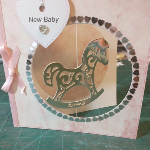 Pink rocking horse new baby girl card