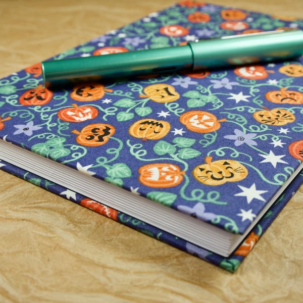 A5 Notebook with glow-in-the-dark pumpkin fabric cover