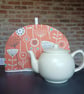 Tea Cosy in Bergen Burnt Orange coloured Fabric - Image 1