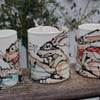 hare on a motorbike mug