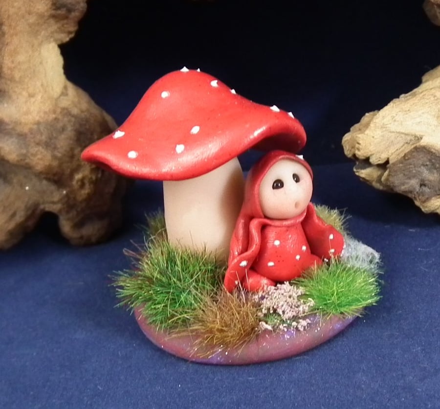Micro Toadstool Gnome on grassy tabeau with toadstool OOAK Sculpt by Ann Galvin