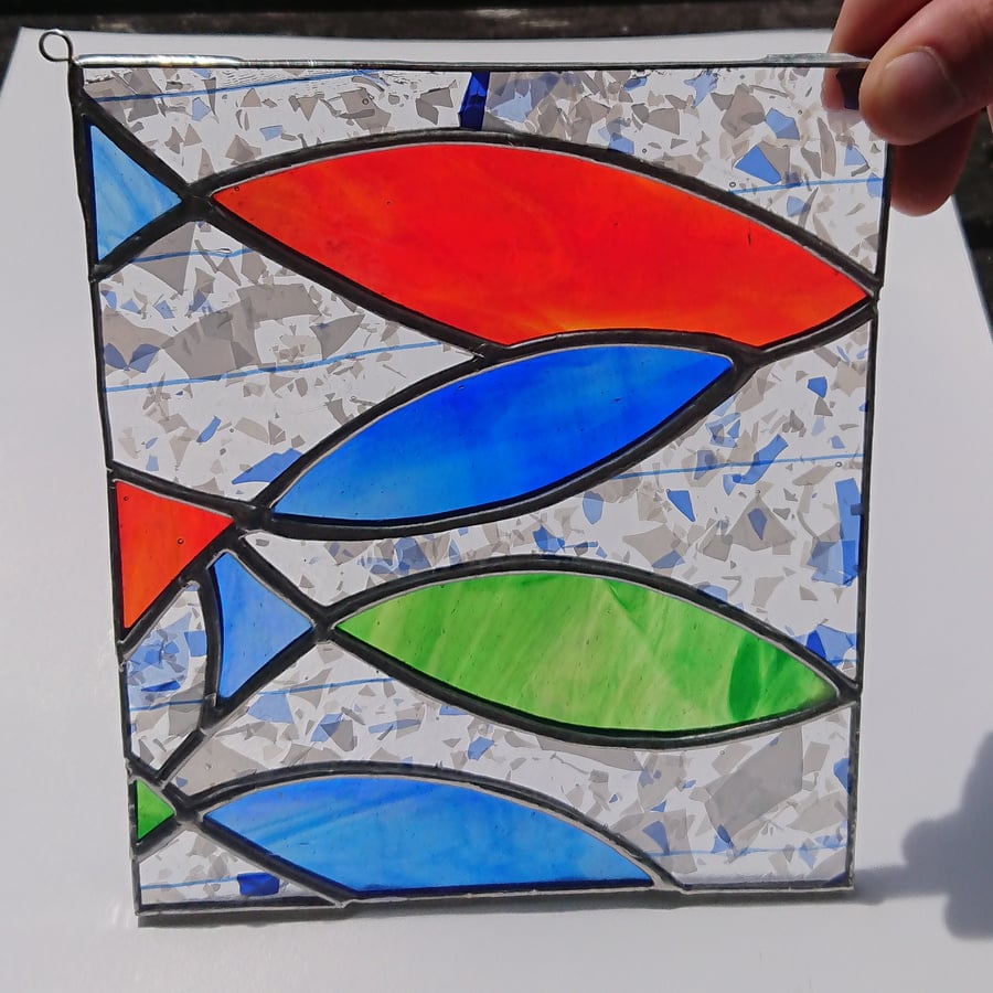 SOLD Stained glass blue, red, green fish hanging panel in copperfoil 