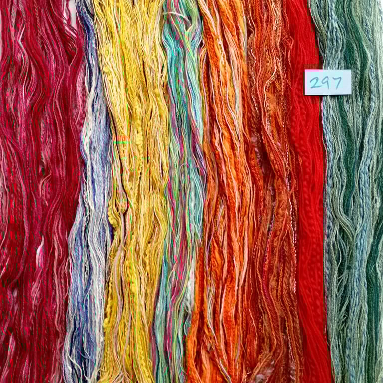 Tapestry, embroidery, weaving, tassel making threads, yarns and fibres. 