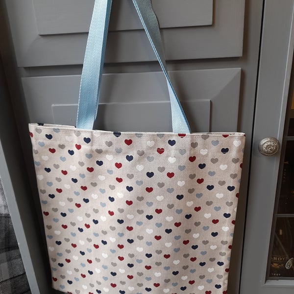 Shopping Bag Cotton Tote Bag Blue Hearts can be folded up in pocket or handbag. 