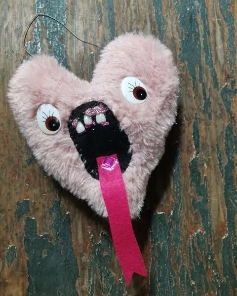 Pink love monster wall hangings, glittery, tooth fairy monsters, hanging heart