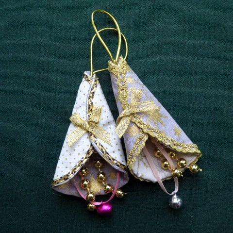 2 stitched textile hanging decorations