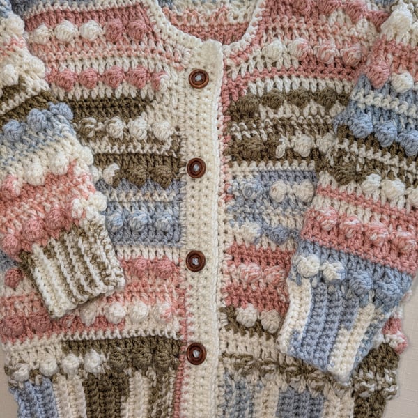 Random neutral coloured cardigan anti pil yarn for an 18 month old little one 