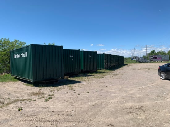 Boat stored under covered shelter at Timberfell Storage