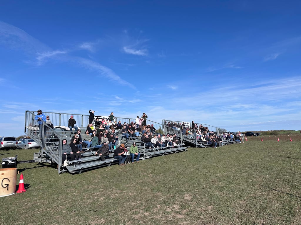 Timberfell crew inspecting bleacher safety rails