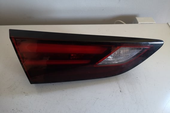 OPEL ASTRA K LAMPA W KLAPĘ LEWA 13401166 HB