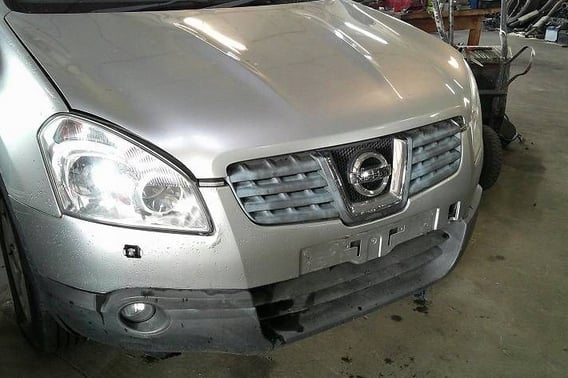 NISSAN QASHQAI J10 MASKA ZDERZAK BŁOTNIK LAMPA PAS PRZÓD KYO G
