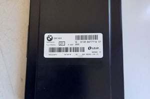 BMW E87 MODUŁ STEROWNIK ŚWIATEŁ 6977719-01