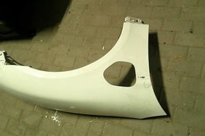 PORSCHE TAYCAN 9J1 BŁOTNIK PRZÓD PRAWY 010S1