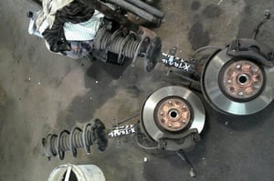 NISSAN X-TRAIL T32 1,6DCI AMORTYZATOR ZWROTNICA PRZÓD PRAWA/LEWA