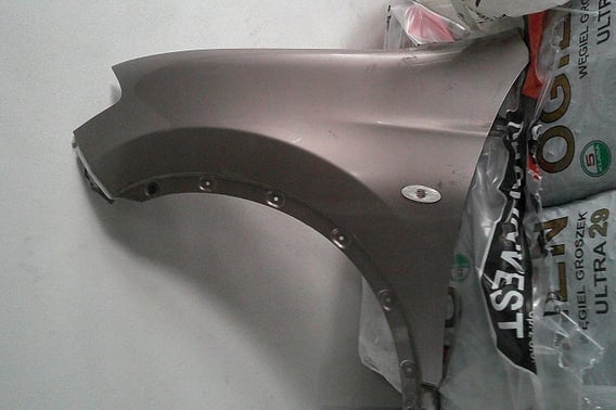 NISSAN QASHQAI J10+2 BŁOTNIK PRZÓD LEWY C30G