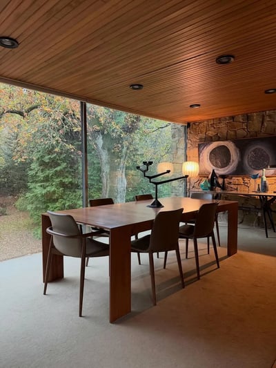 Mid-Century Modern Dining Room with Forest View