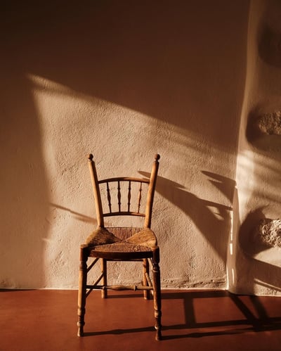 Rustic Wooden Chair in Warm Sunlight