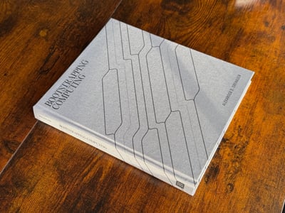 Bootstrapping Computing Book on Dark Wood Table