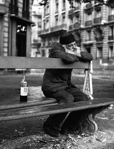 Contemplative Solitude on a Parisian Bench