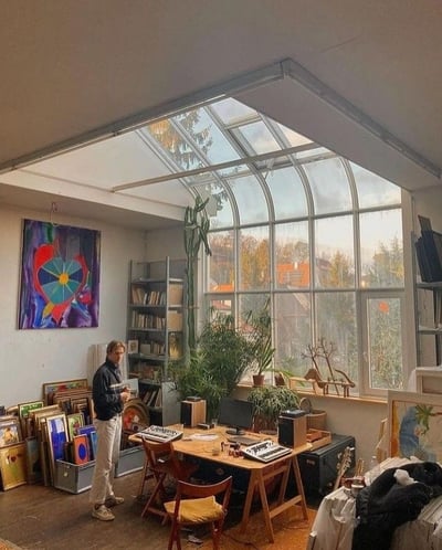 Sun-Drenched Artist Studio with Curved Glass Skylight