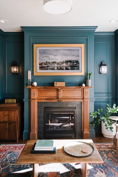 Sophisticated Teal Living Room with Classic Wood Mantel