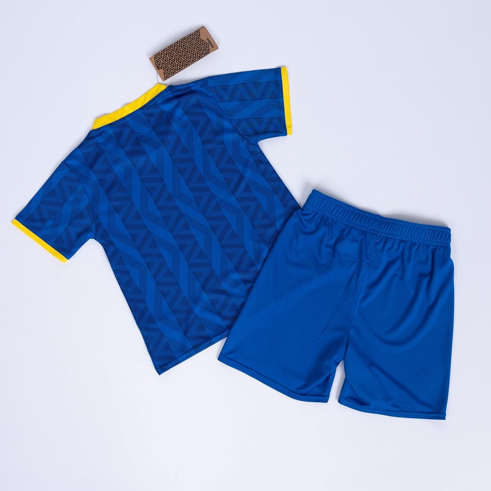 Kinder AFC Wimbledon 2024/25 Heim Kit
