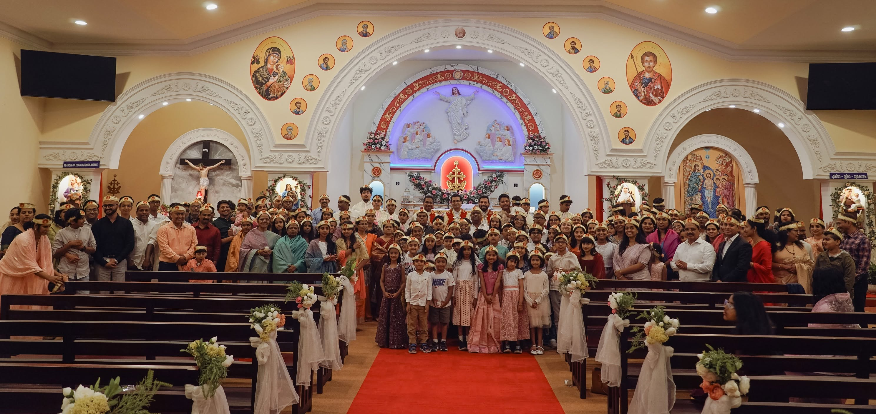 A congregation gathered in a candlelit church