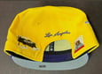 NEW ERA 950 LOS ANGELES LAKERS AMARILLO MORADO CON PARCHES