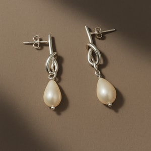 Arete Nudo Con Perla