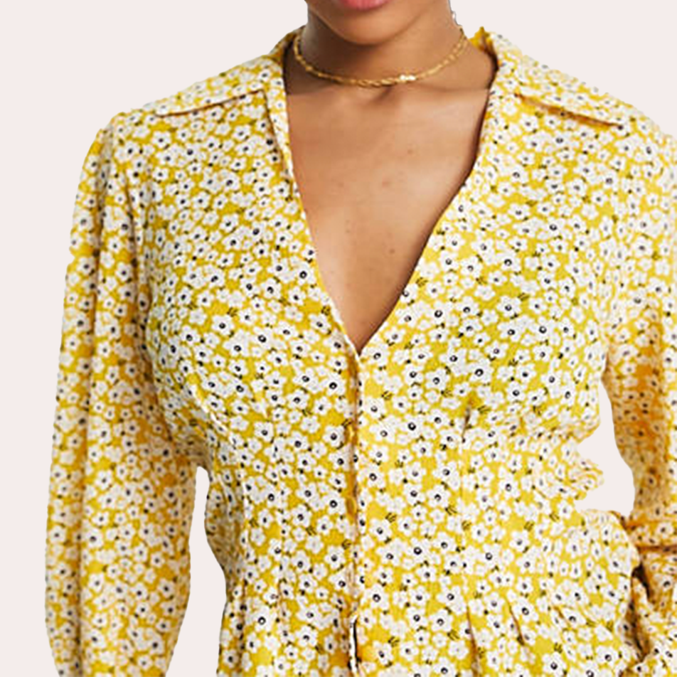 Camisa amarilla con botones floral