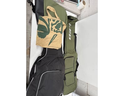 Comprehensive collection of bags, including guitar...