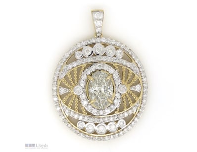 14K YELLOW GOLD AND DIAMOND, STATEMENT PENDANT.   ...
