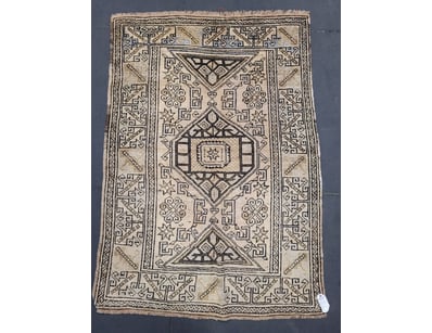 TURKISH HANDMADE WOOL RUG WITH CENTRAL MEDALLION

...