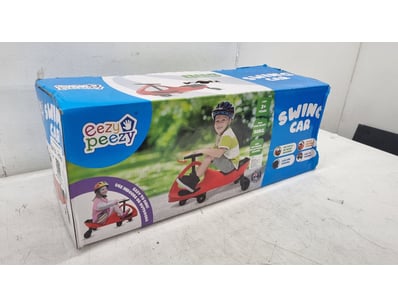 Eezy Peezy Swing Car - a red and black ride-on toy...