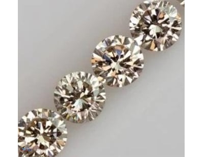 0.13 CARAT LIGHT BROWN 4 ROUND DIAMOND        

Co...