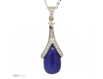 14K YELLOW GOLD, 11.15CT TANZANITE AND DIAMOND, DR...