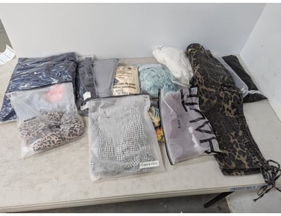 Assorted clothing includes pants, tshirts and more...