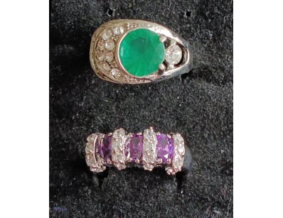 2 SILVER RINGS WITH GREEN AND PURPLE ZIRCONS      ...