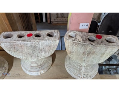 Set of four whitewashed wooden pedestal candle hol...