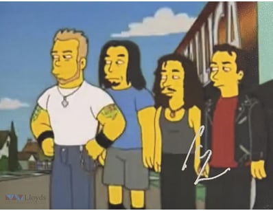 METALLICA'S LARS ULRICH SIGNED SIMPSONS PHOTO

Lar...