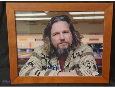 THIS IMAGE FEATURES A FRAMED, AUTOGRAPHED PHOTOGRA...
