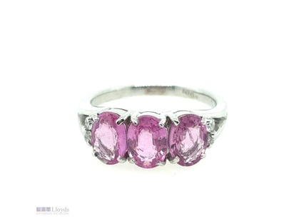 18CT WHITE GOLD SAPPHIRE AND DIAMOND RING

Featuri...