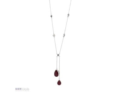 14K WHITE GOLD, RUBY AND DIAMOND, NECKLACE.      
...