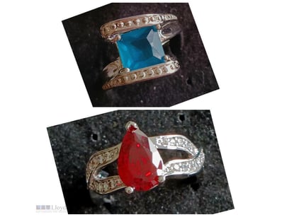 2 SILVER RINGS WITH RED AND BLUE ZIRCONS        

...