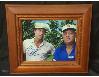 THIS IS A FRAMED, AUTOGRAPHED PHOTO FEATURING CHEV...