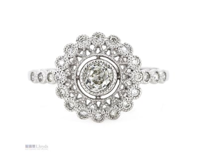 14K WHITE GOLD AND DIAMOND, ORNATE HALO RING.     ...