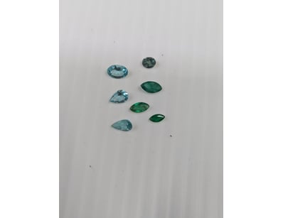 Green and blue coloured stones x 7

SOLD AS LOT