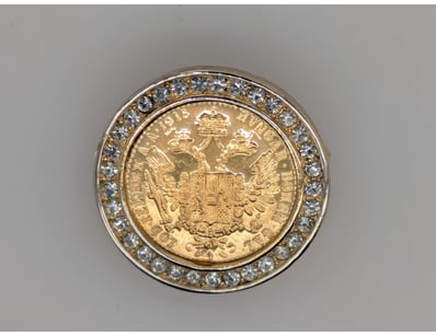 PLASTE FRAME GOLD PLATED COIN PENDANT


583010+...