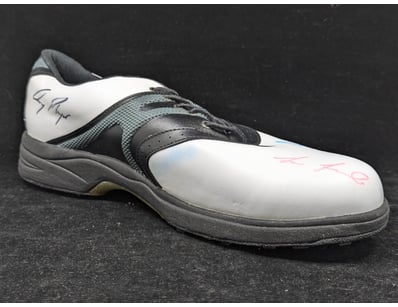 SIGNED GOLF SHOE WITH VARIOUS PLAYER SIGNATURES
...
