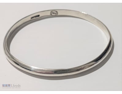 STERLING SILVER MEXICO BANGLE     

Marked Sterlin...